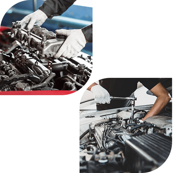 Mechanic installing a car engine part